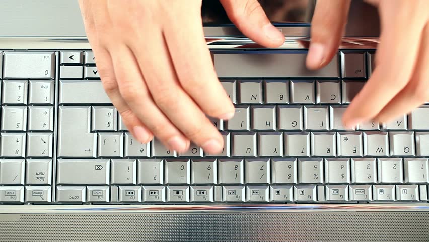 Closeup of a worker using a laptop computer 