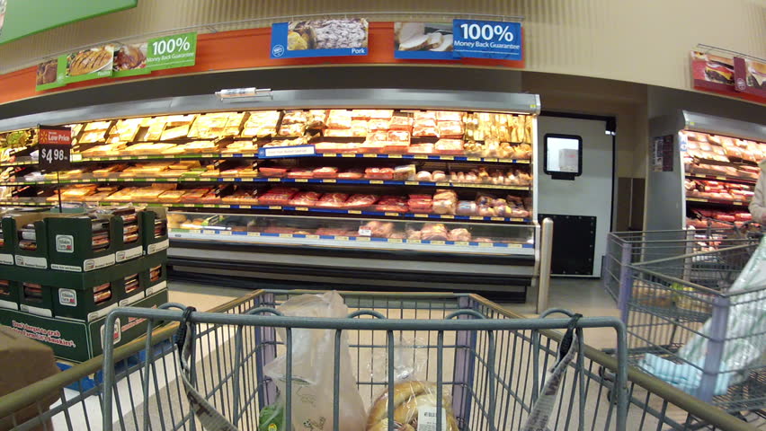 EPHRAM, UT - DEC 13 - (Fast Motion) Consumers purchase goods at Walmart during the busy holiday season December 13, 2011 in Ephram, Utah.