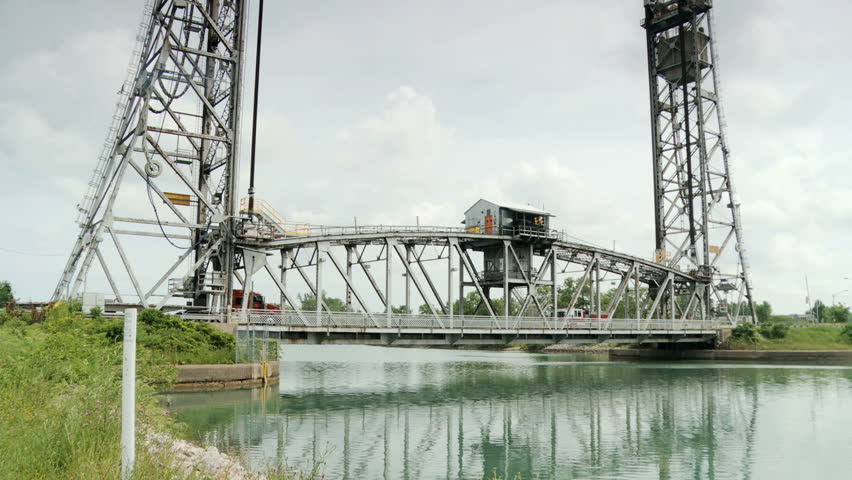 Traffic moving across Vertical Lift Bridge on the Welland Canal at Welland, Ontario, Canada.