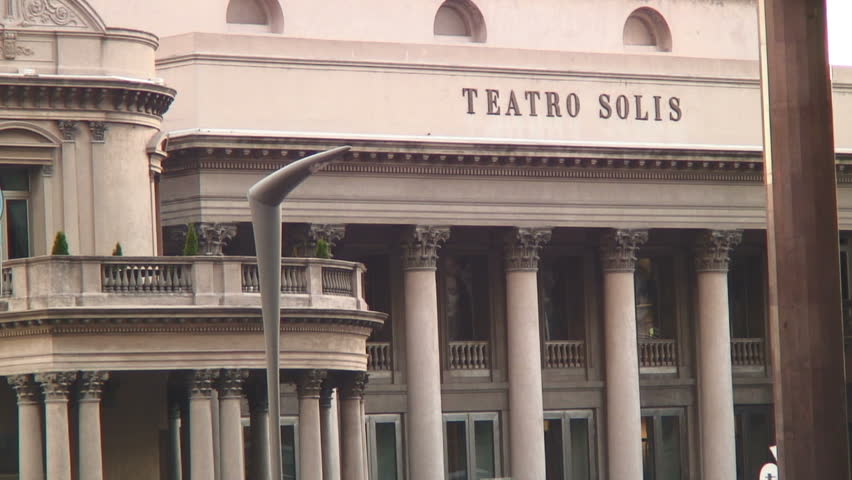MONTEVIDEO, URUGUAY - CIRCA 2010 - Busses Pass in Front of the Teatro Solis, Uruguay's oldest theater circa 2010