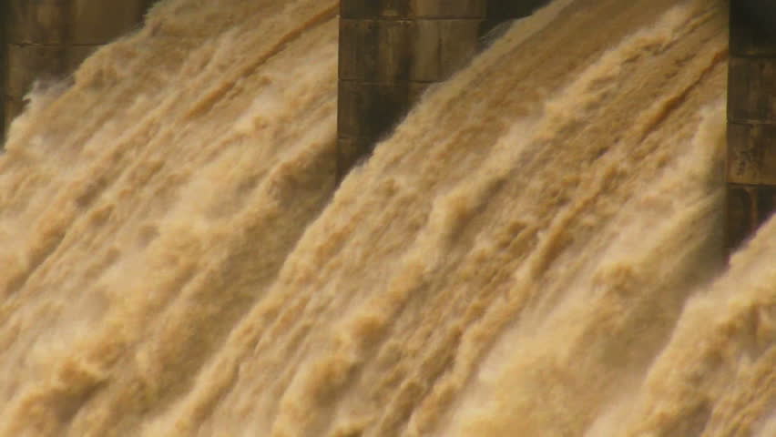Trujillo Alto Dam with open gates after storm. Closer view.