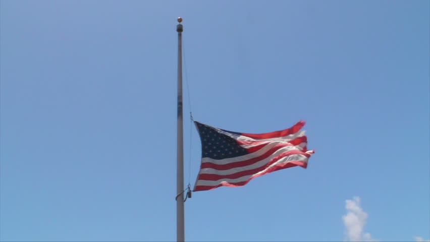 US American Flag at Half Mast for Fallen Soldiers.