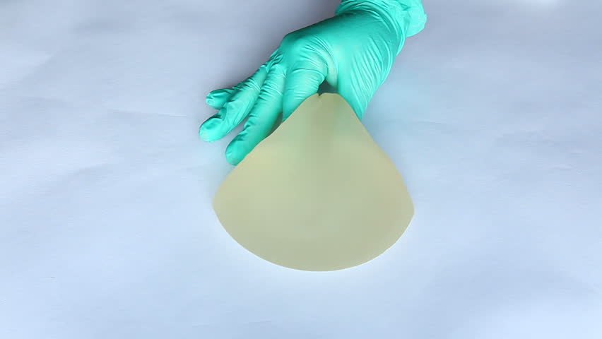Examination breast silicone gel implant puncture rupture leakage