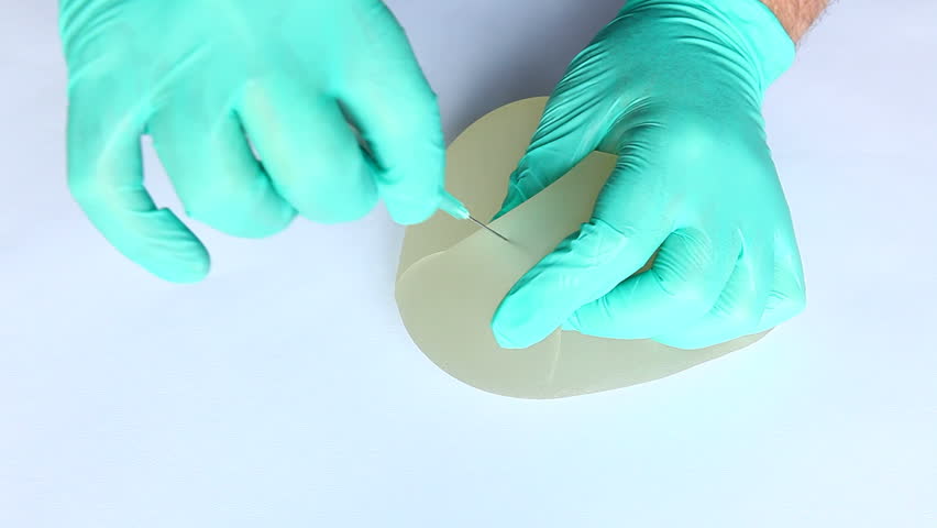 Test breast silicone gel implant puncture rupture leakage