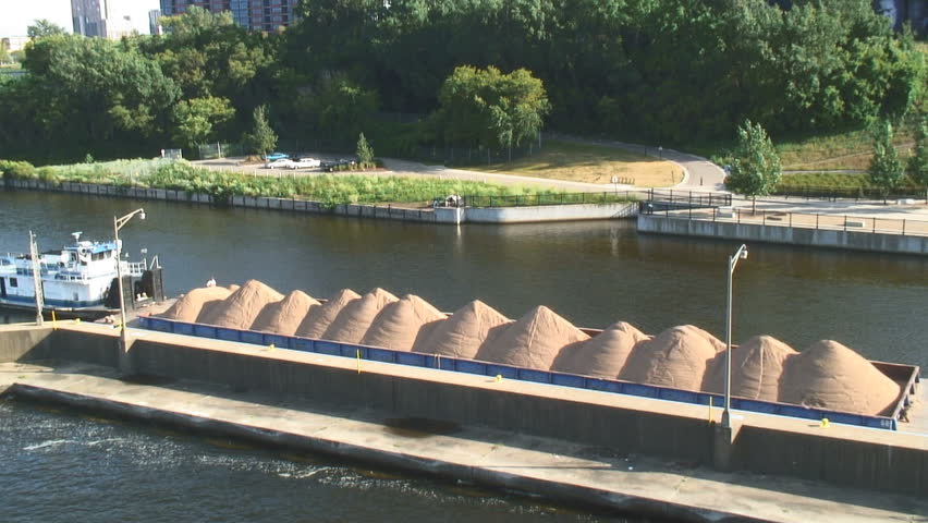MINNEAPOLIS, MINNESOTA, USA - SEPTEMBER 15, 2008: Barge Going Upstream Mississippi, Minneapolis