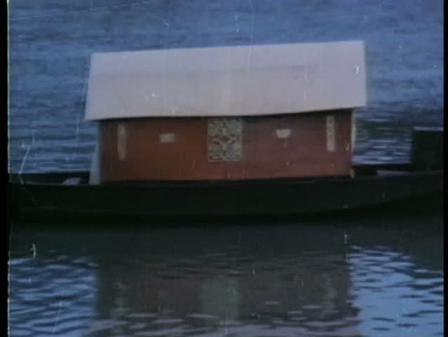 Houseboat floating in water
