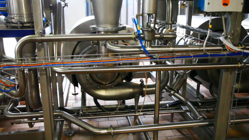 dairy equipment and pipes, panorama from bottom up