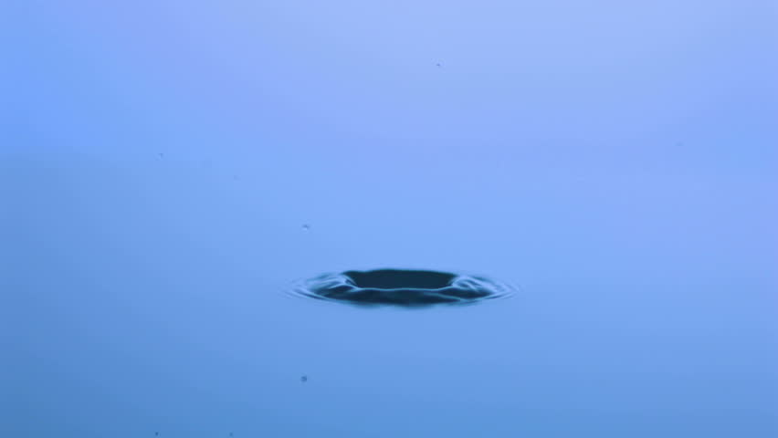 Slow-motion drop hitting water shooting with high speed camera, phantom flex.