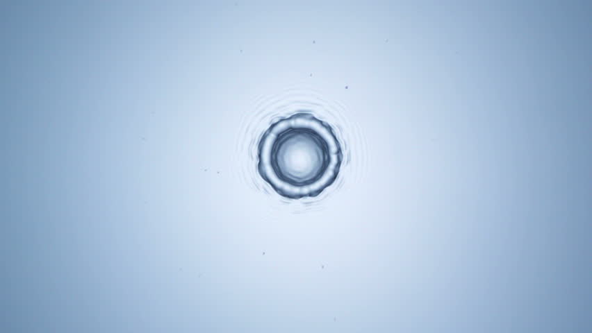 Extreme close-up water drops rippling