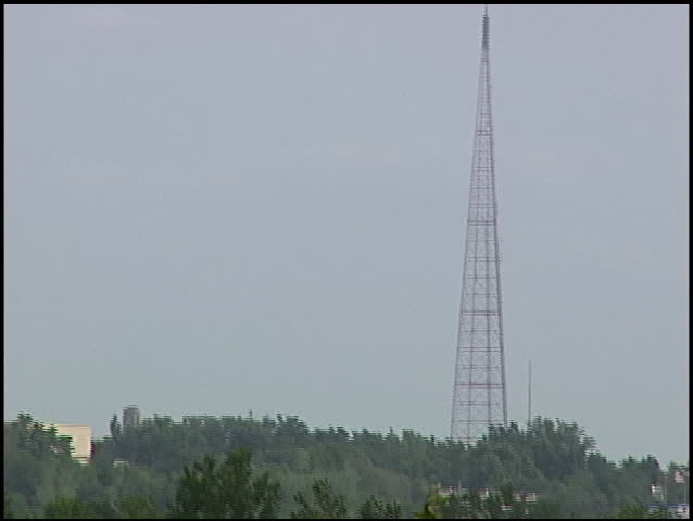 F-16 Fighting Falcon jet flies through the Kansas City skyline