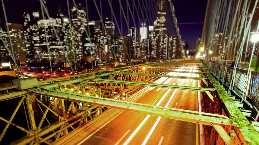 Brooklyn Bridge and New York City skyline at night, time lapse