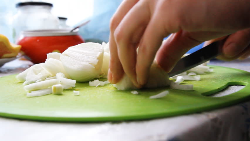cut onions with a knife
