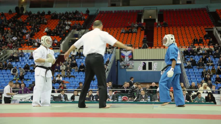 MOSCOW - FEBRUARY 19: Two sportsmen kudo Ontgontseren from Mongolia and Wasinhal from India fight on tatami in Olympiysky Sports Complex at World Cup 2011 KUDO on February 19, 2011 in Moscow, Russia.