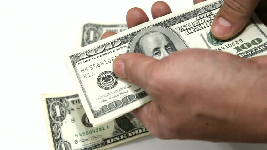 Counting hundred dollar bills