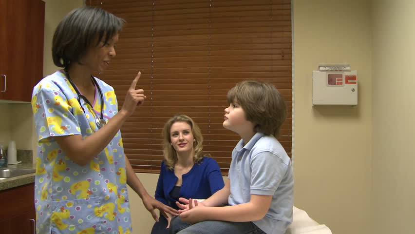 Nurse checks patients vision and balance