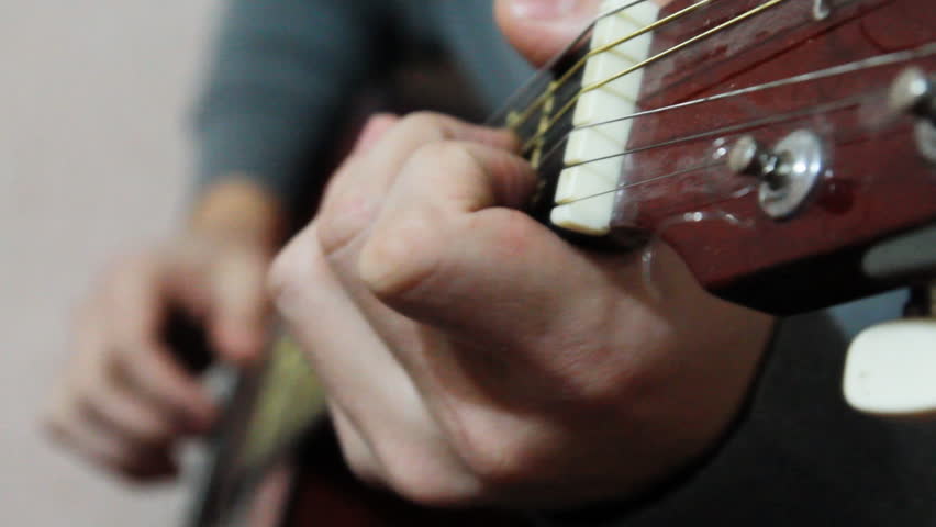 play on guitar