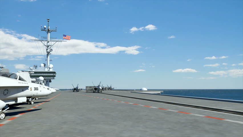 Three F18 hornets taking off from an American aircraft carrier. 