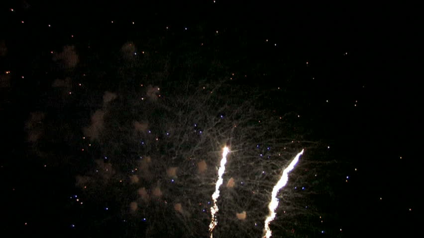 Slow motion of fireworks at Fort Sam Houston Army post at night. Celebration.