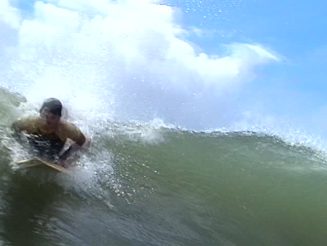 Brazilian surfer. Close-up.
