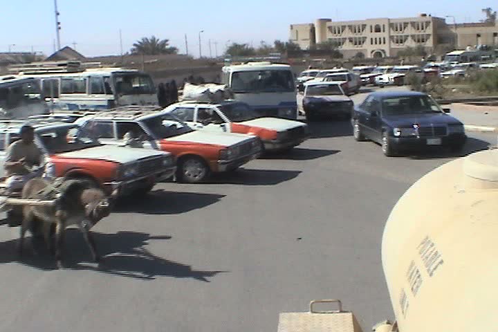 IRAQ - CIRCA 5/1/03: Iraqis use donkey carts for transportation.