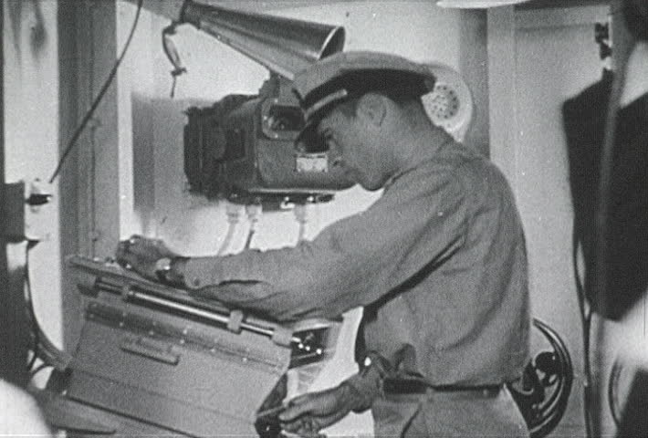ATLANTIC OCEAN - CIRCA 1942-1944: World War II, Crewmen Monitoring Adjusting Equipment
