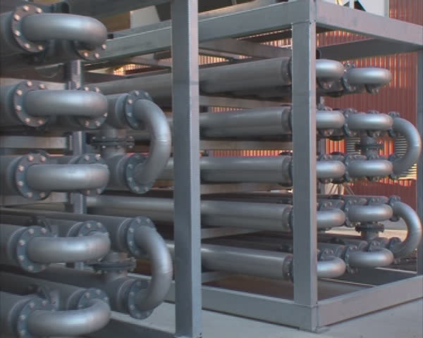 Water treatment plant technology. Lot of bent metal tubes.
