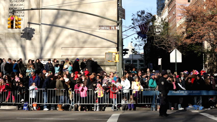 NEW YORK CITY, NY - NOVEMBER 24: Large Crowd of people on Central Park West during Macy's Thanksgiving Day Parade on November 24, 2011 in New York City, New York.