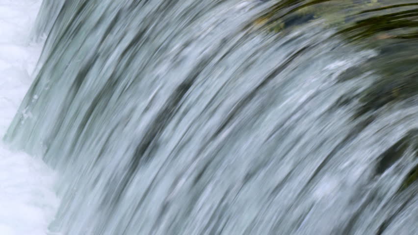 Flowing water from Banias Spring shot in Israel.
