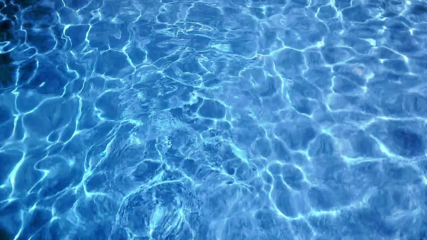 Pool Water Background refraction of sunlight and water ripples in swimming pool water Pool Water Background refraction of sunlight and water ripples in swimming pool water