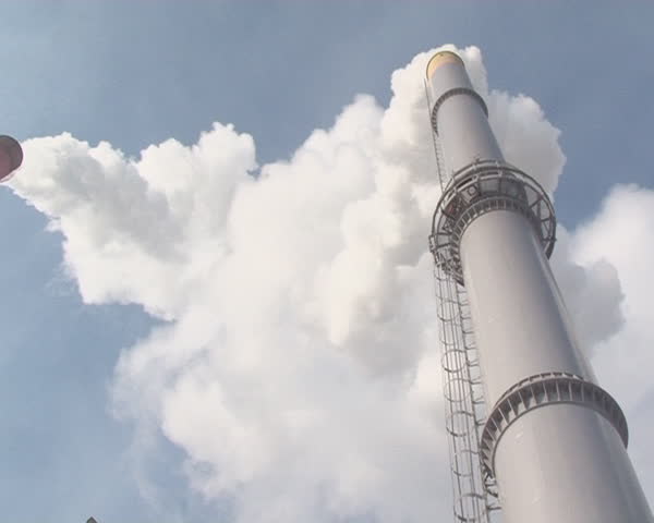 Smoking fumes from boiler stack chimney. Warm-town in the winter. Special equipment.
