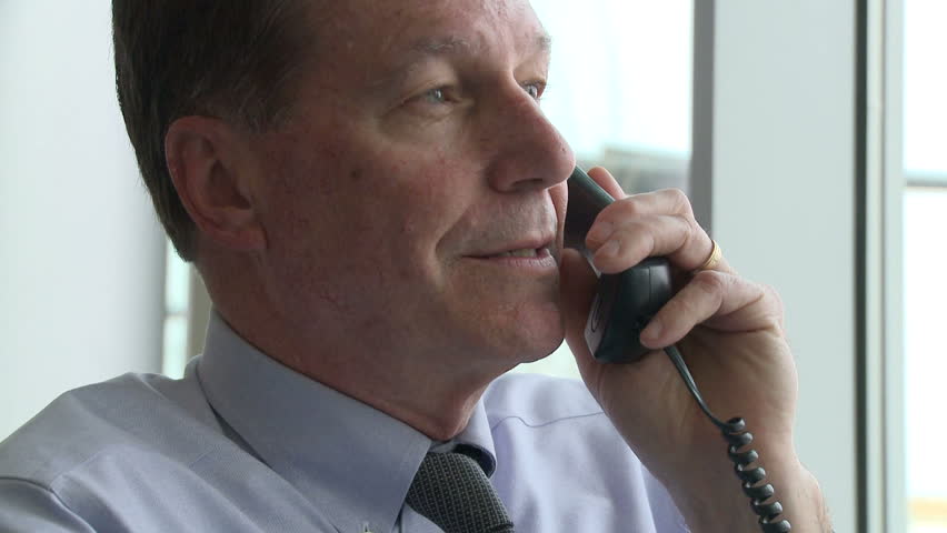Middle aged man on phone (1 of 2)