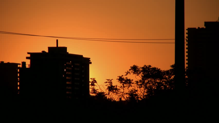City sunrise. Timelapse.
Fast timelapse shot of sun rising in the city. Condos in silhouette. Toronto,Ontario, Canada.
