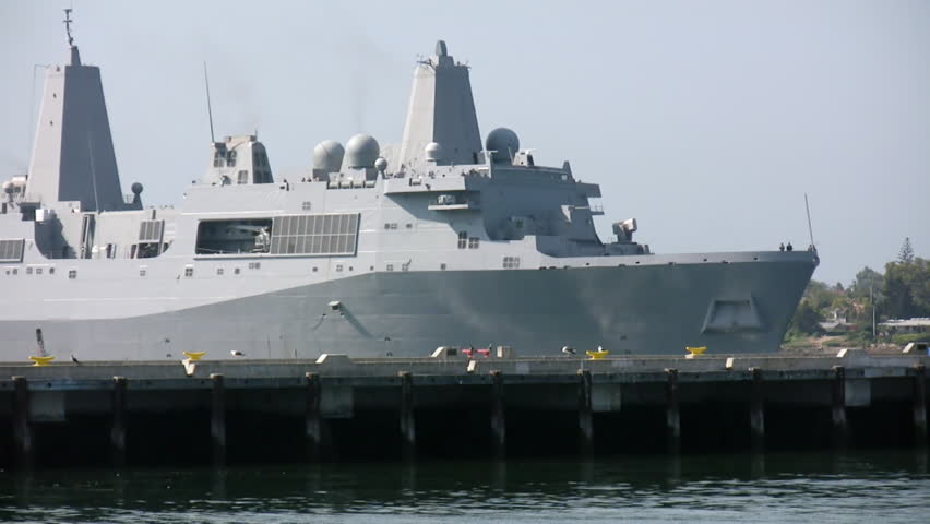 Navy Communications Ship Entering Dock (HD). Navy communications ship entering port for docking. All ID marks, numbers and legends have been cloned out.