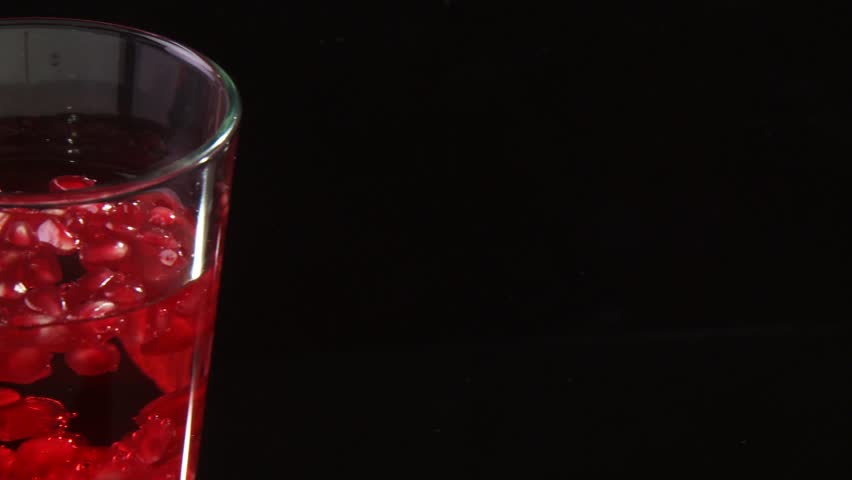 Drink with pomegranate seeds