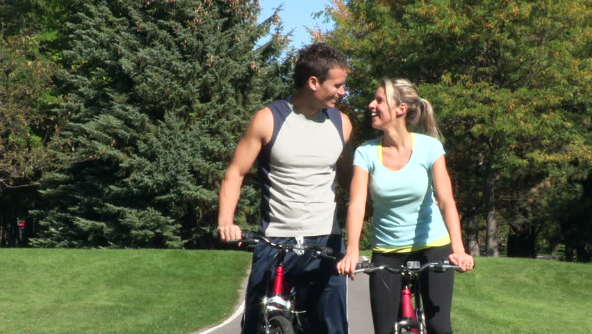 Happy couple cyclist.
