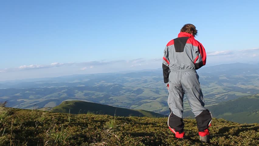 Skydiver checking the wind conditions