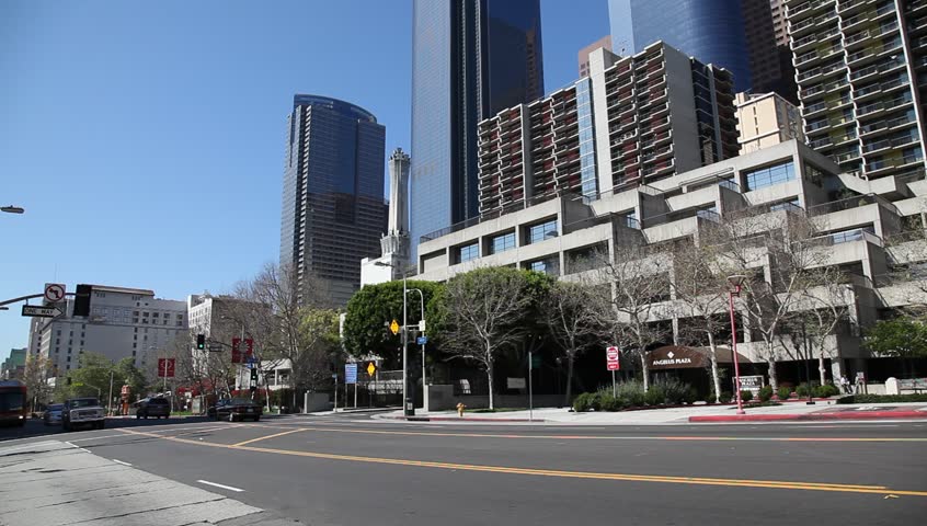 LOS ANGELES, CALIFORNIA, USA - MARCH 3, 2012: Public bus leaves a business district on March 3, 2012 in Los Angeles, California