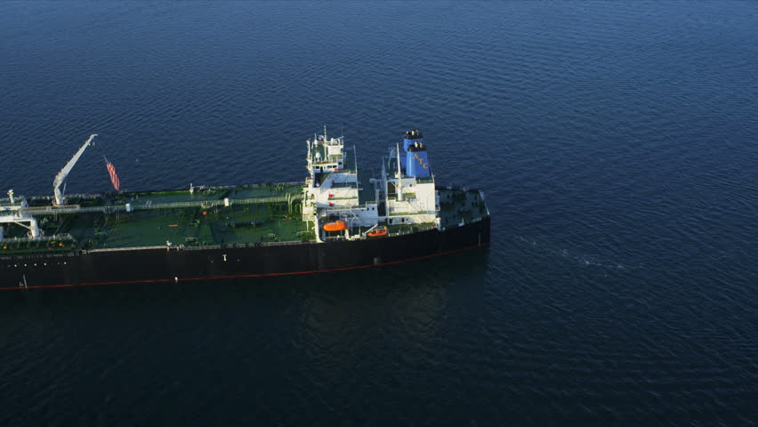 Aerial view of oil container tanker moored deep ocean, North America, USA