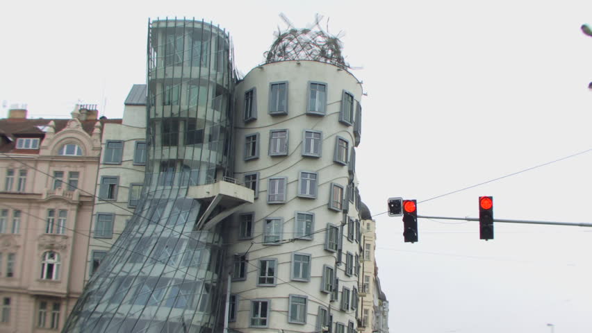 WIDE SHOT, Stoplight next to modern building, Dancing House aka 'Ginger and Fred', Prague, Czech Republic