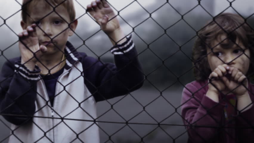 Children's loneliness. Abandoned. Homelessness. Orphans in slums. Video clip shows lonely children. Orphans in the refugee camp. Static Shot. Clip ID: children4_HD