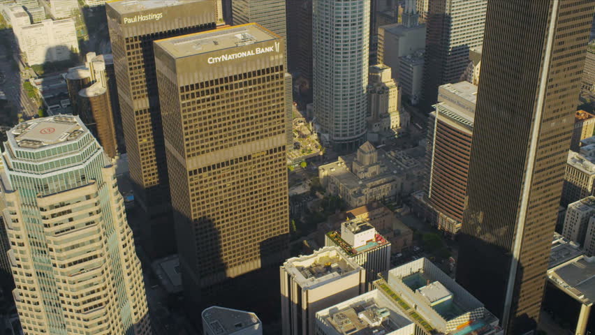  Aerial view of the sun shinning on the skyscrapers of Los Angeles 