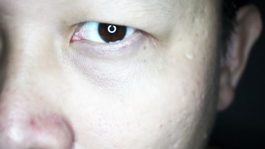 Closeup of fearful man's eye
