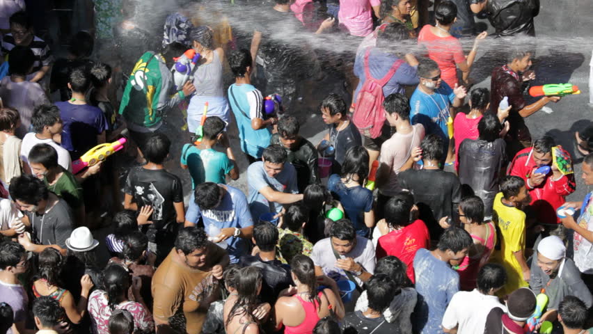 BANGKOK - APRIL 15, 2012: Thai people are celebrating Songkran Water Festival at Silom in Bangkok  on April 15, 2012. 