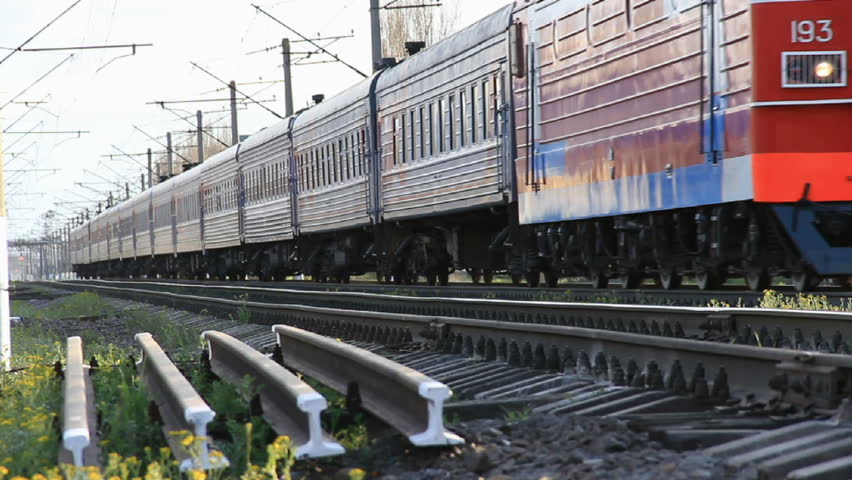 Passenger train moving along track