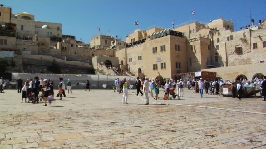 JERUSALEM - CIRCA 2010: A panoramic shot of spectators visiting the Western Wall Square circa summer 2010 in Jerusalem, Israel.