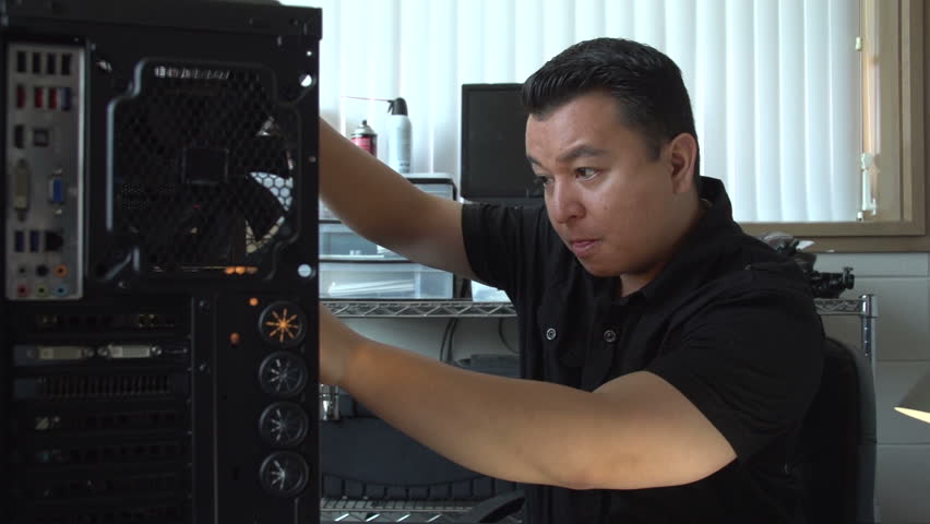 Man fixing computer