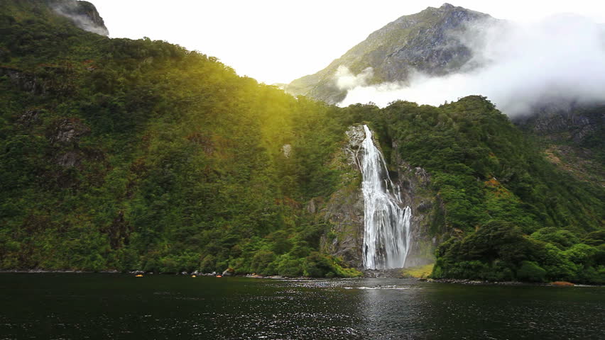 View on Lady Bowen Falls from boat, Milford Sound Fjord. South Island, New Zealand.