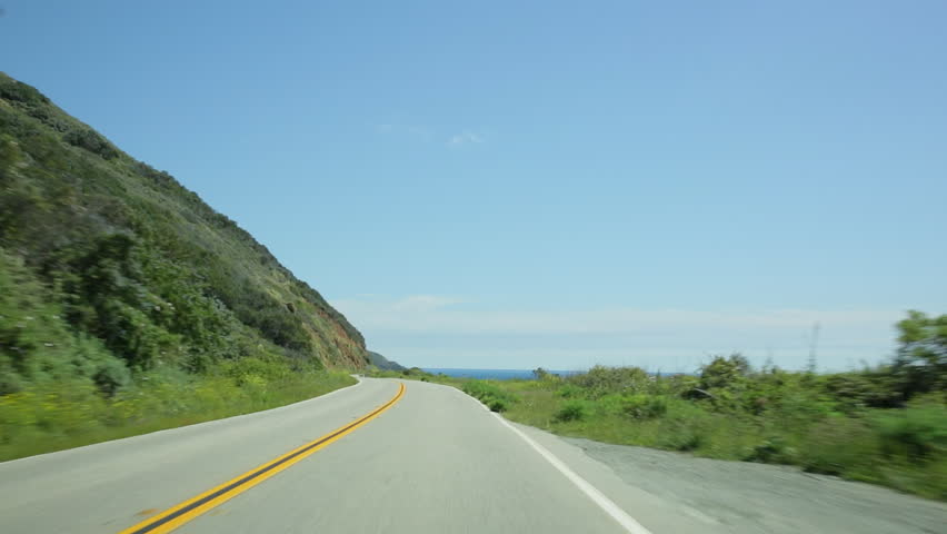 Vehicle point-of-view driving south on California Highway 1 (aka Cabrillo Highway or Pacific Coast Highway) in the Big Sur area of Central California.