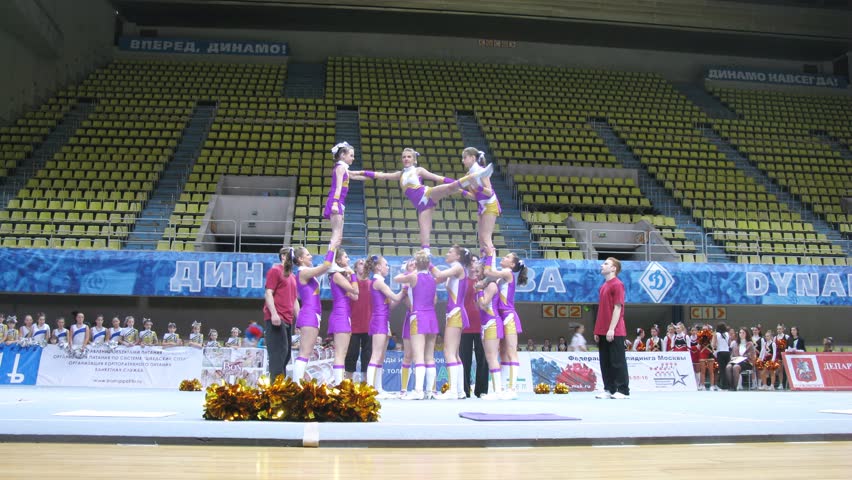 MOSCOW - MAR 24: (Timelapse View) Tsunami team participates in Annual competitions of Championship of Moscow on cheerleading in Dynamo sports palace, on March 24, 2012 in Moscow, Russia