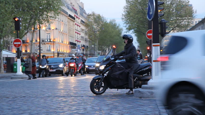 PARIS, FRANCE APRIL 8th: Paris scooter on evening of April 8th, 2012 in Paris, France. Ave Bosquet and Av. de la Motte-Picquet. Evening in Paris, France.  